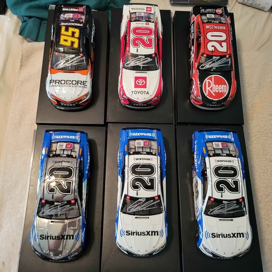 Set of six NASCAR diecast race cars, blue/black and white with numbers 20–21.