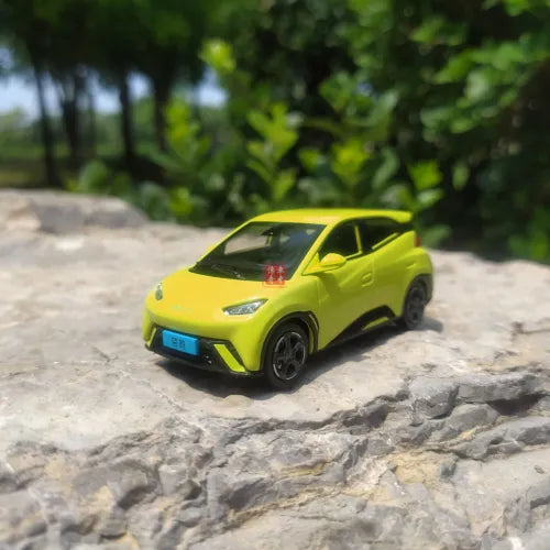 Lime green BYD Sea Gull diecast model car with black accents, front 3/4 view