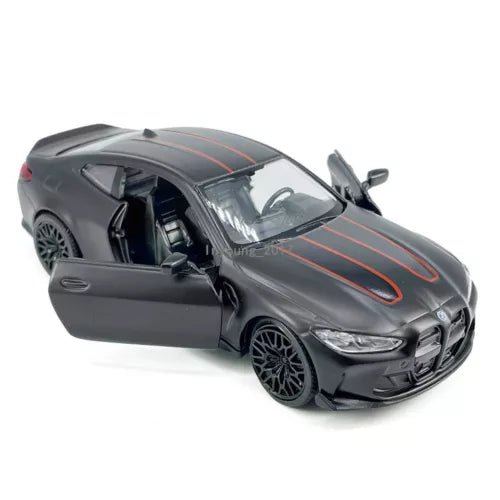 1:36 scale BMW M4 CSL diecast model car, black with orange racing stripes, doors open