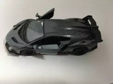 Gray Lamborghini Veneno diecast model car, low front view with black details and rear wing