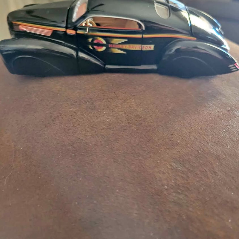 1939 Lincoln Zephyr street rod diecast model, dark blue front-side view