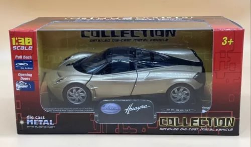 Silver diecast pull-back car in clear-front retail box, Huayra branding, age 3+