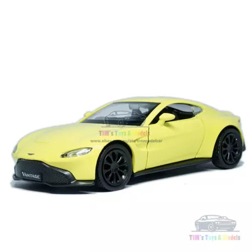 Yellow Aston Martin Vantage diecast model car, 1:36 scale, side view.