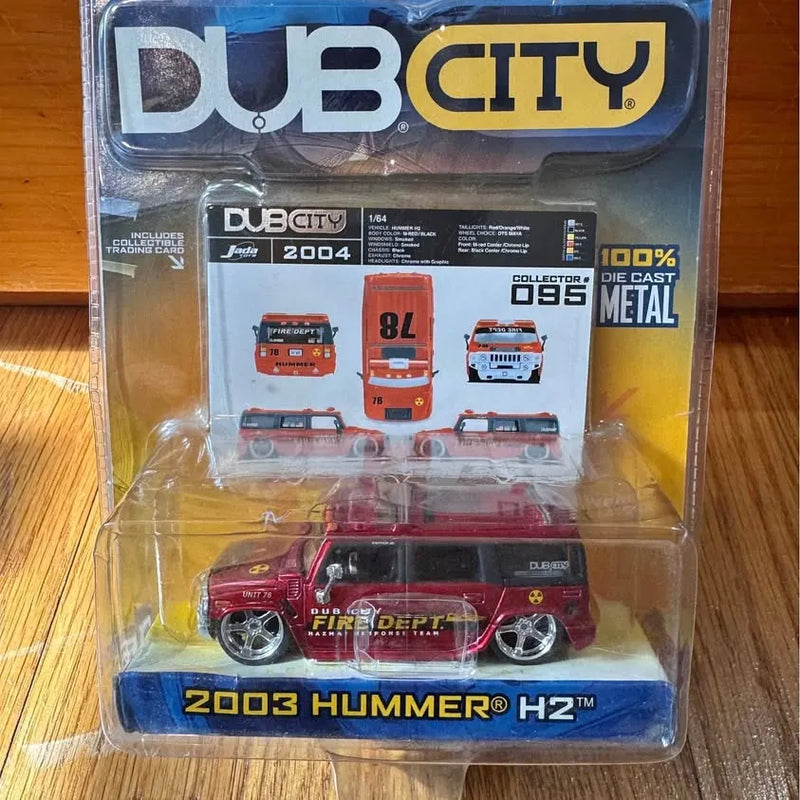 Die-cast Hummer H2 TM model car, red and black, in retail package