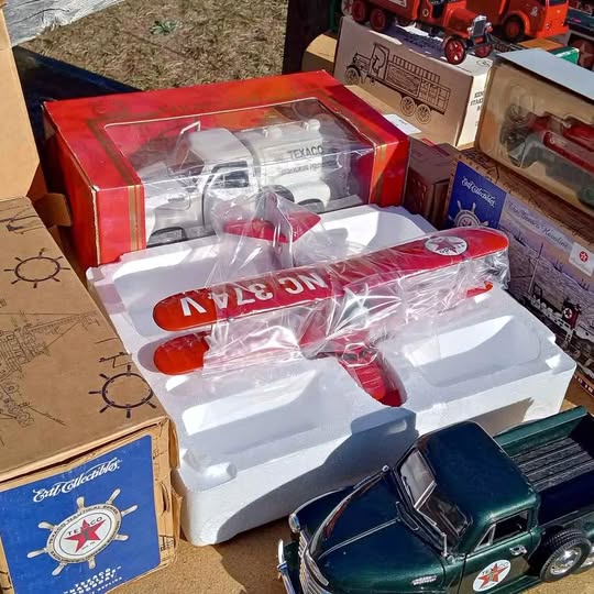 Texaco diecast car assortment in red-and-white blister packaging with two cars