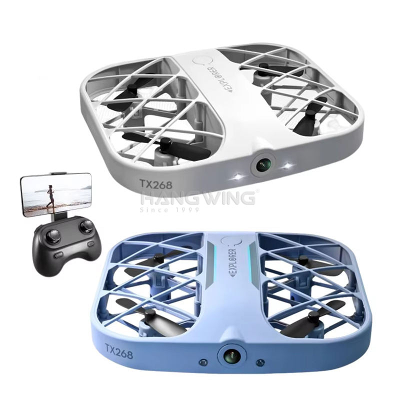 Small quadcopter drone with four propellers and handheld remote control