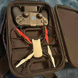 DJI Tello drone with propellers in a zippered carrying case