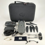 DJI Mavic Pro drone kit with DJI RC, spare propellers, cables, and carrying case