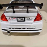White diecast race car model with rear spoiler, red taillights