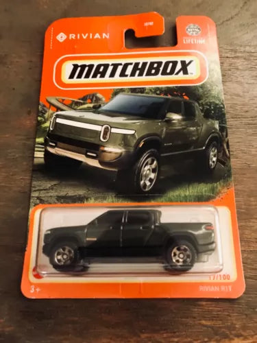 Matchbox Rivian R1T diecast SUV in dark green, in retail blister packaging
