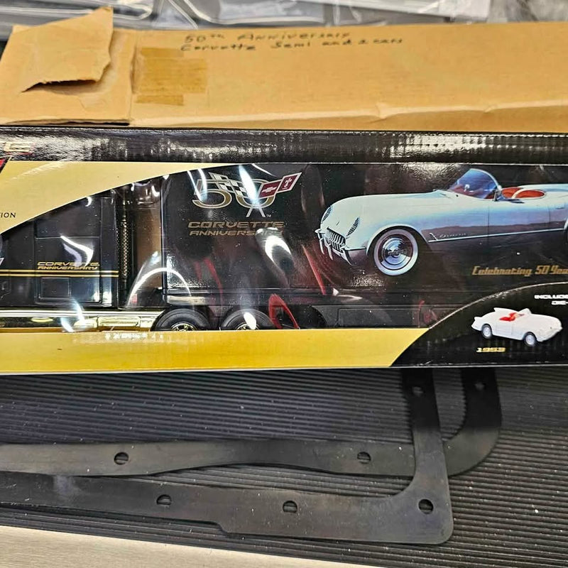 Diecast Corvette semi truck model in retail box, yellow and black with white wheels