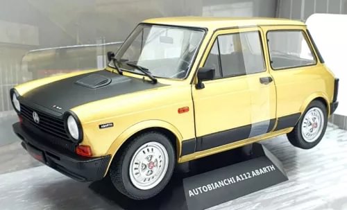 1/18 diecast car model, yellow with black hood stripe, white-spoke wheels