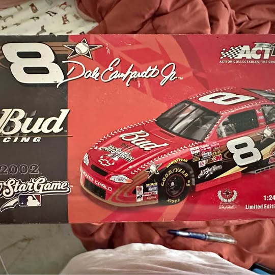Red NASCAR diecast race car, #8 Bud Racing Pak Canada, 1:24 scale