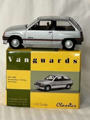 1:43 scale diecast Vauxhall Nova station wagon model with box, silver and black