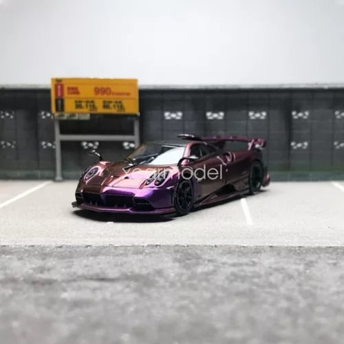 1:64 scale purple diecast sports car model, front three-quarter view