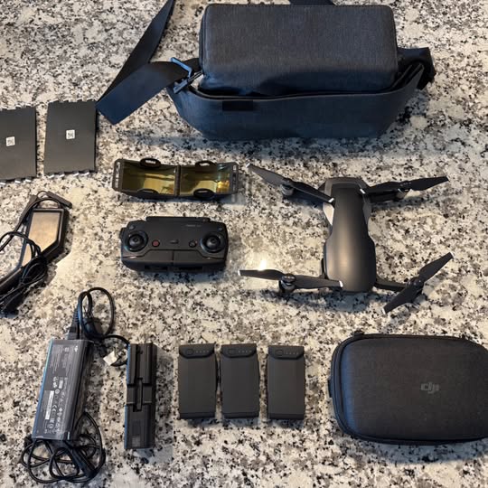 Drone Fly More combo accessories with case, controller, batteries and compact drone