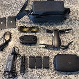 Drone Fly More combo accessories with case, controller, batteries and compact drone