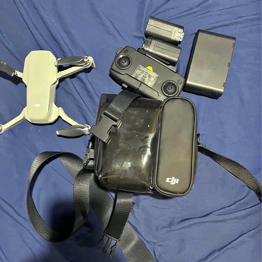 DJI Mavic Mini drone in case with controller and straps