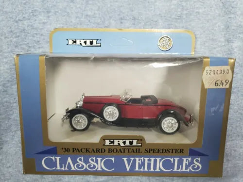 Classic Packard boat-tail speedster diecast car in display box, red and black