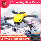 Yellow folding arm quadcopter drone with blue LED lights and camera