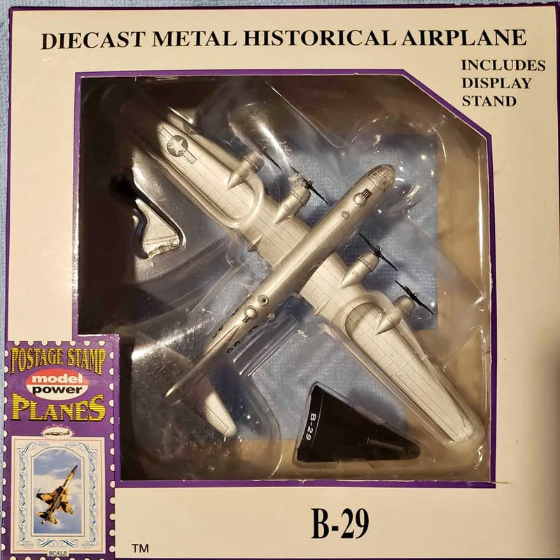 Diecast metal B-29 airplane model in clear display box, gray and silver