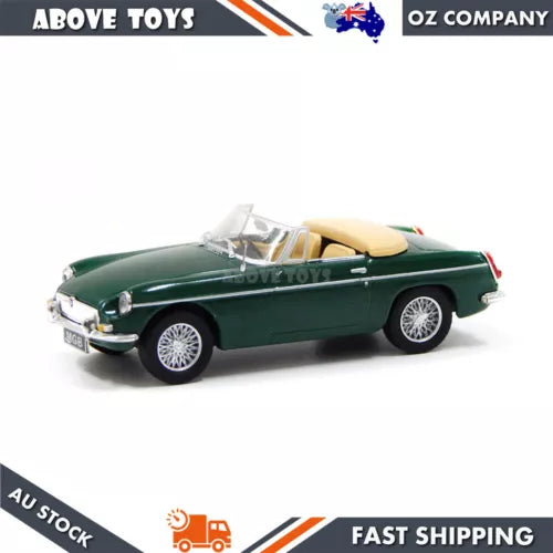 Green diecast convertible model car with white wheels and chrome grille, side view.