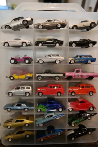 Diecast car collection with display case, multiple diecast cars arranged in a grid