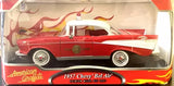 Red 1957 Chevy Bel Air die-cast model car in display box with flame graphics