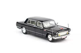 1:64 diecast luxury sedan model car in black, front three-quarter view with chrome trim