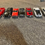 1:24 scale diecast cars set, front views in red, black, and white