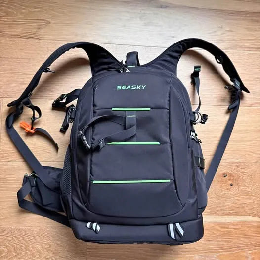 Drone backpack with padded front pocket and side straps, dark blue, Seasky logo