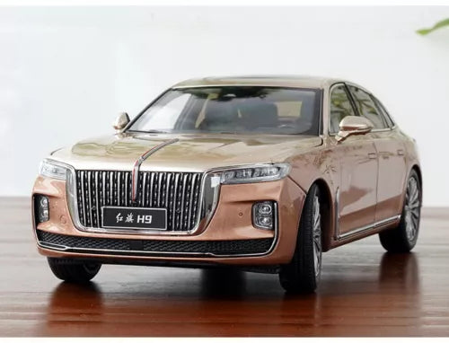 1/18 diecast sedan model in bronze, front view with chrome grille and headlights