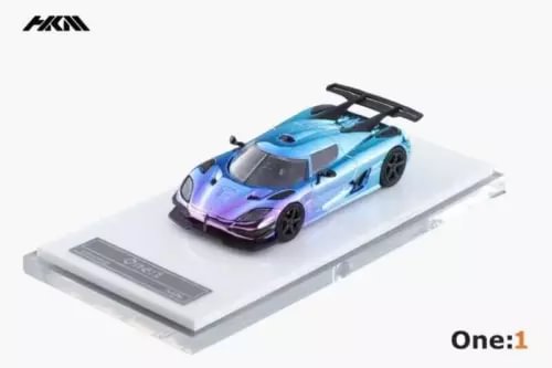 1:64 diecast model car of a Koenigsegg Agera in light blue with purple accents