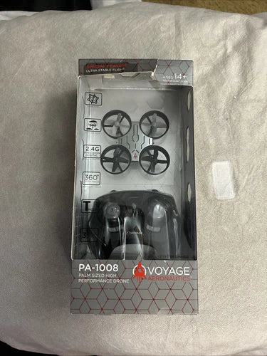 Unopened box palm-size high performance drone, black, with product graphics and drone image