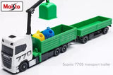 Maisto die-cast freight trailer truck model, white cab and green flatbed with blue/yellow details