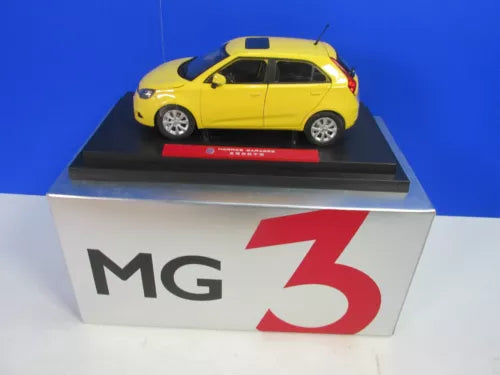 Yellow 1:18 diecast car model in MG 3 box