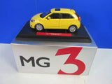 Yellow 1:18 diecast car model in MG 3 box