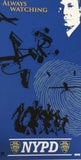 Blue graphic T-shirt with NYPD emblem and drone campaign artwork