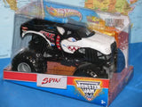 Black and white Monster Jam diecast monster truck with Spike graphics in box