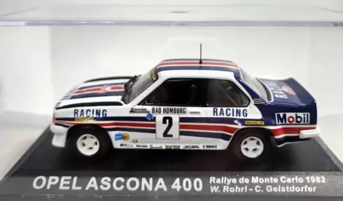 Racing diecast model car with blue, white, and black livery, number 2 and Mobil logo