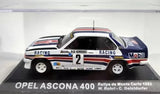 Racing diecast model car with blue, white, and black livery, number 2 and Mobil logo