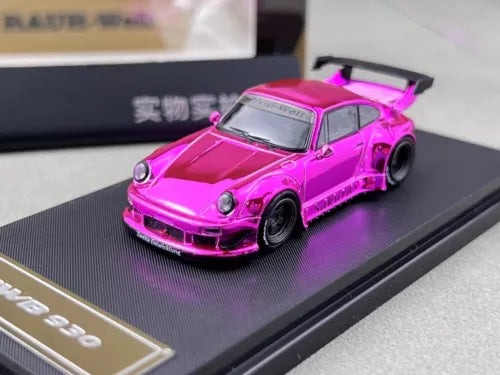 Purple diecast sports car model with rear spoiler and black wheels