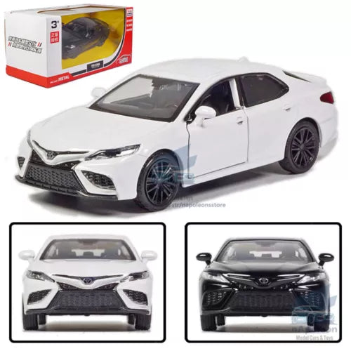 White alloy diecast model car in front three-quarter view, detailed grille and headlights