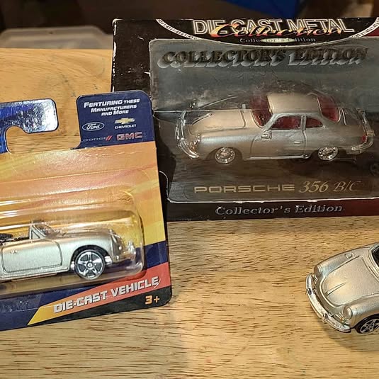 Diecast Porsche 356 B/C toy car in display box, silver body with red details