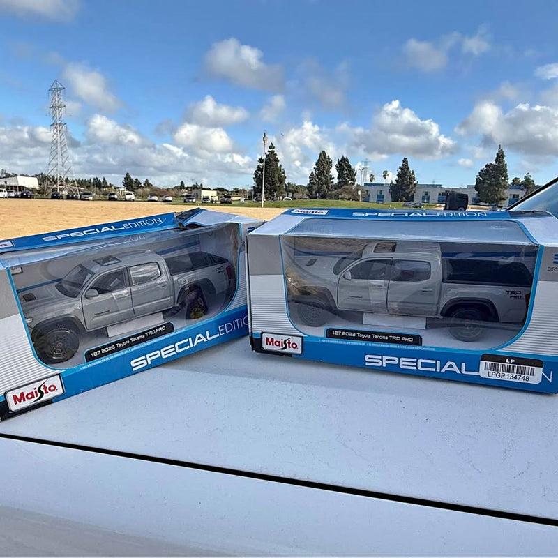 Diecast pickup truck models in Special Edition display boxes