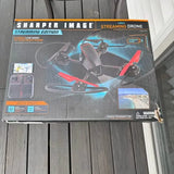 Sharper Image streaming drone retail box with colorful drone illustration and features