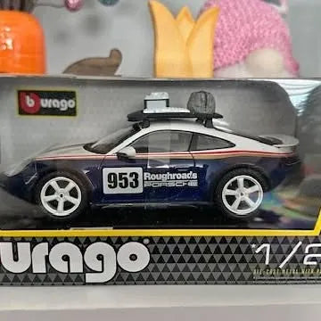 Bburago Porsche 911 Dakar Weissach diecast racing car, dark blue with 953 number