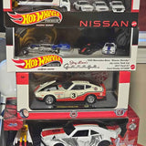 Hot Wheels Premium diecast cars in blister box, Nissan and garage graphics
