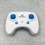 Kids drone remote control unit, white with blue buttons and HEYGLO logo
