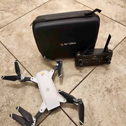 Foldable quadcopter drone with camera, controller, and carrying case